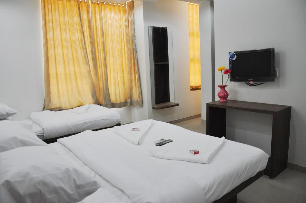 Sai Srushti Hotel Shirdi Ruang foto