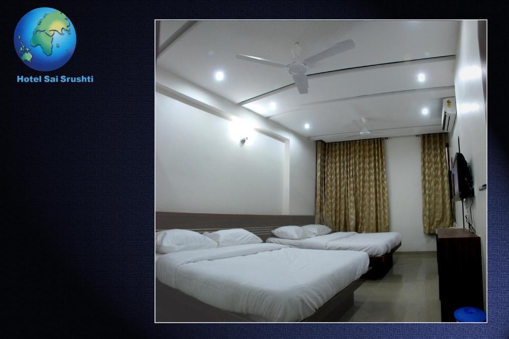 Sai Srushti Hotel Shirdi Bagian luar foto